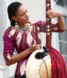 Sona Jobarteh tuning her Kora